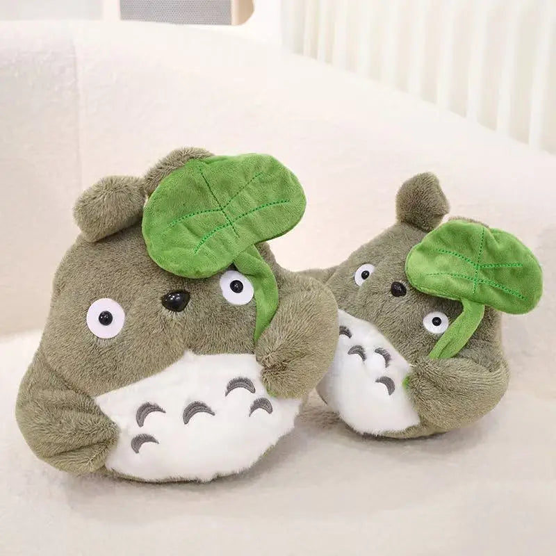 Cartoon forest creature plush pillow, brown plush with green leaf cap and white belly