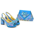 Sky blue peep-toe heeled shoes and matching patterned clutch bag with bow detail