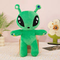 Green alien plush toy standing, horn tentacles and black eyes, arms outstretched