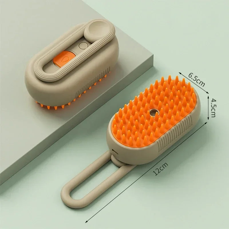 Pet steam brush with orange bristle head showing handle and front size markings