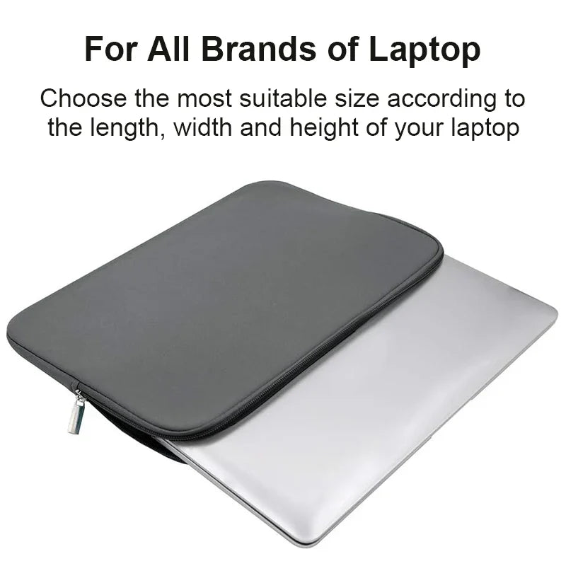 Grey laptop sleeve with front opening, holding a laptop in a protective fit.