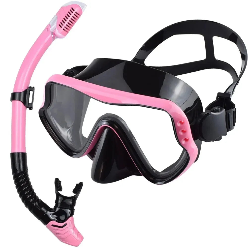 Adults dry snorkeling mask and snorkel set with pink frame, black skirt, and snorkel tube.