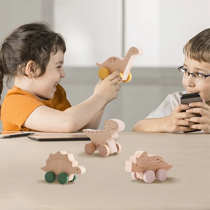 Wooden dinosaur teether car toys while children play together