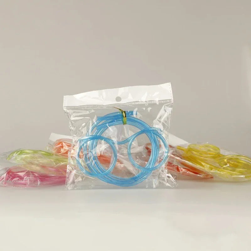 Packed novelty straw glasses set with blue frames, clear lenses, and straw