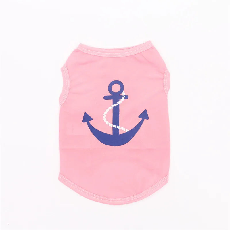 Light pink dog t-shirt with navy anchor emblem on the front