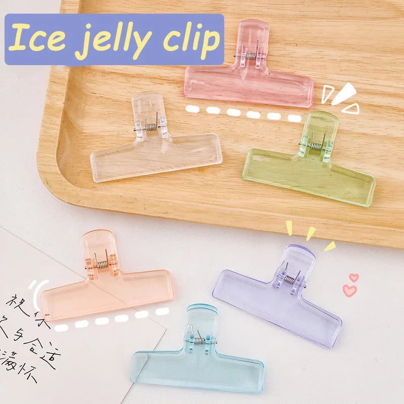 Set of clear jelly clip storage stationery clips in purple, orange, blue, pink, green, white