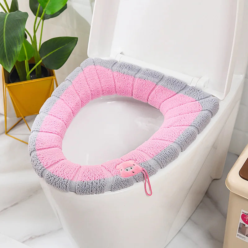Gray and pink plush toilet seat cover mat with handle cord and animal patch