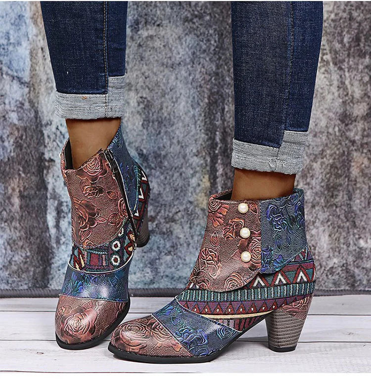 Women’s ankle boots with multicolor embroidered pattern, side zipper, and low block heel.