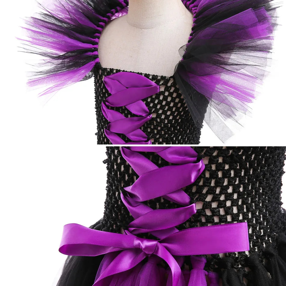 Girls black tulle corset dress with purple ribbon rosette bow at the waist
