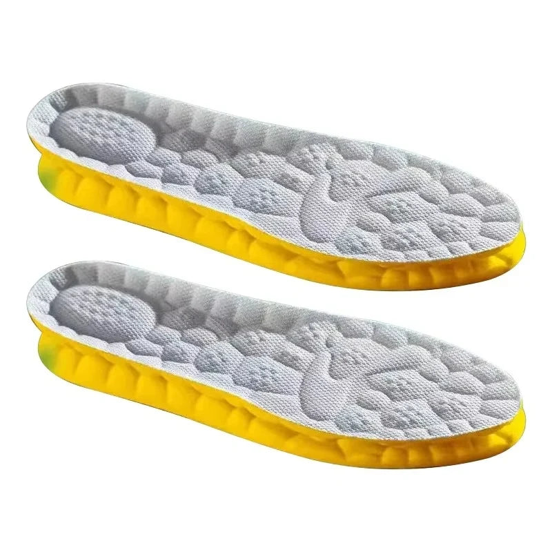 Pair of breathable sports insoles with gray tops and yellow shock-absorbing layer
