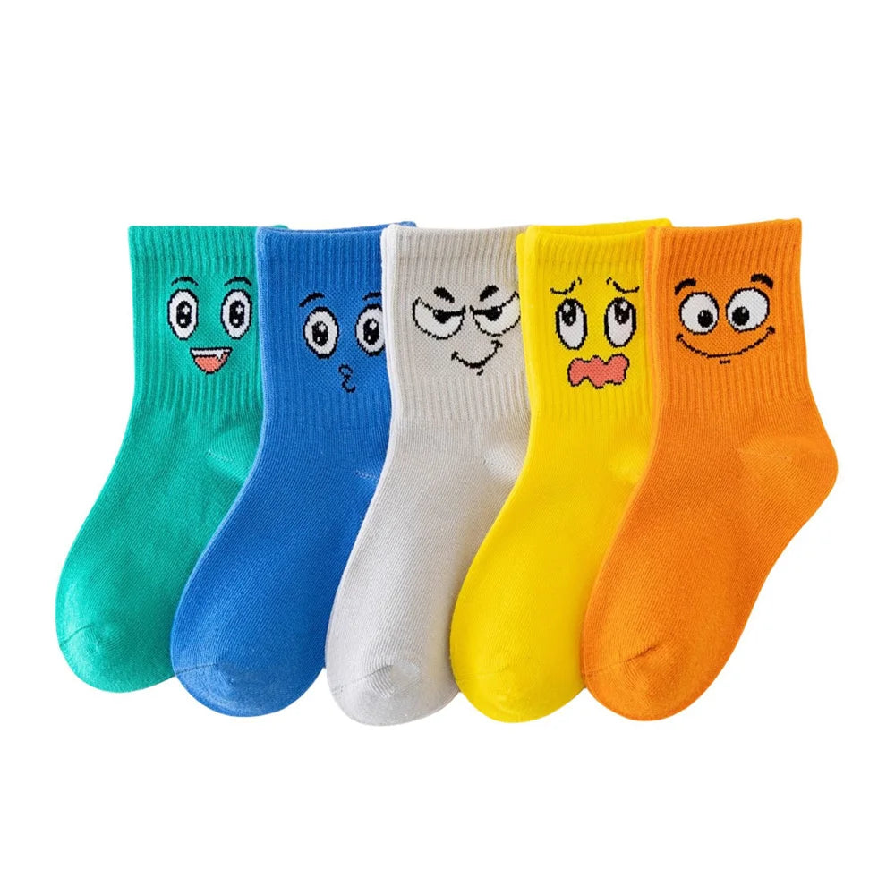 Kids crew socks 5-pair set with colorful cartoon face designs: teal, blue, white, yellow, orange.