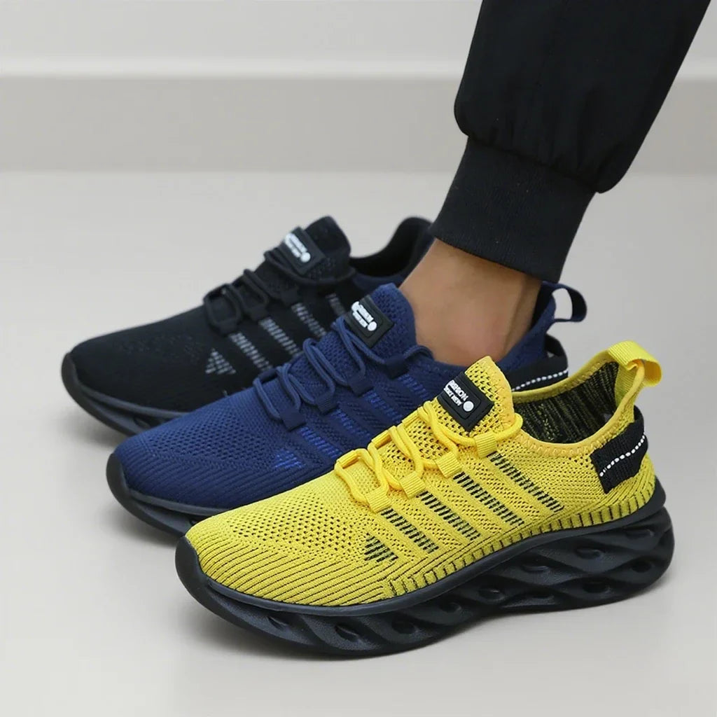 Breathable knit sports shoes in black and yellow, thick tread sole, lace-up design
