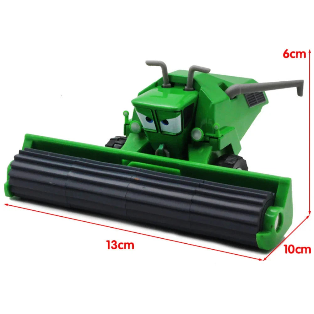 Green diecast vehicle toy with bulldozer blade and crane arms, side view.