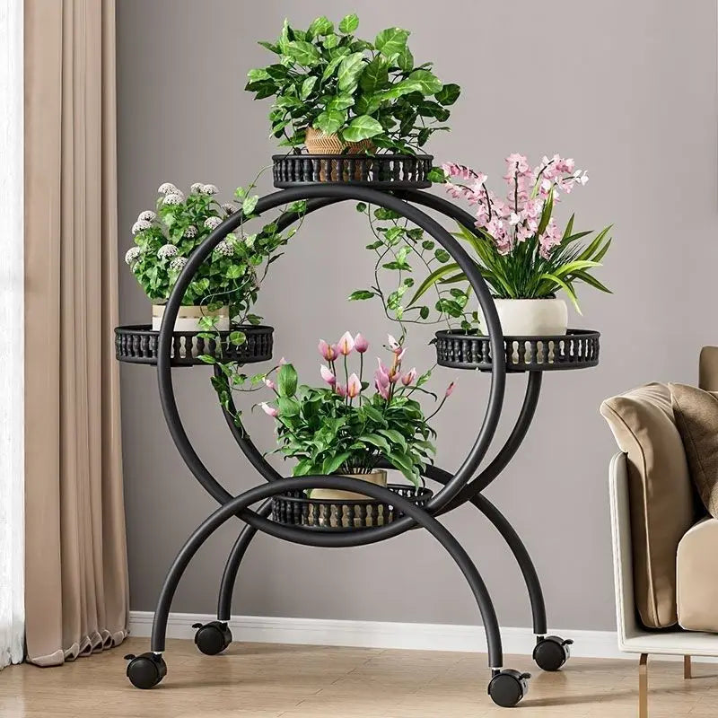 Matte black metal multi-tier circular plant stand with ring shelves and rolling casters