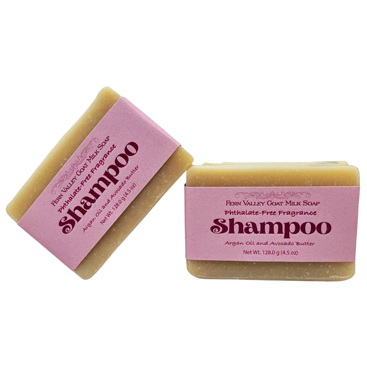 Handmade shampoo soap bar pair: tan bars with pink labels, angled side-by-side view