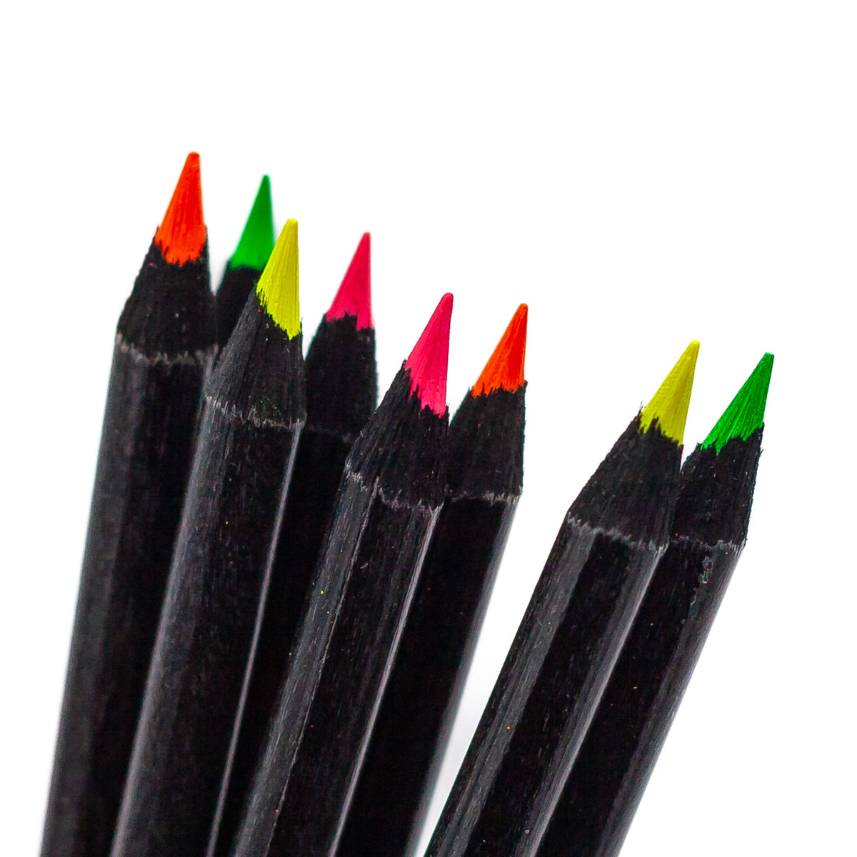 Close-up of highlighting pencils with neon-colored tips: orange, green, yellow, pink