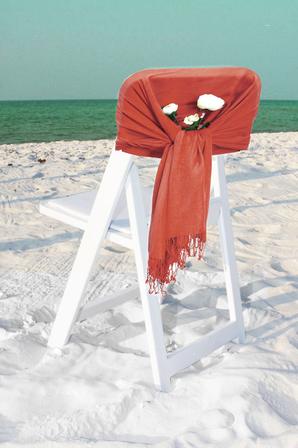 Rust-orange pashmina-style shawl wrap scarf with fringed ends, solid color.