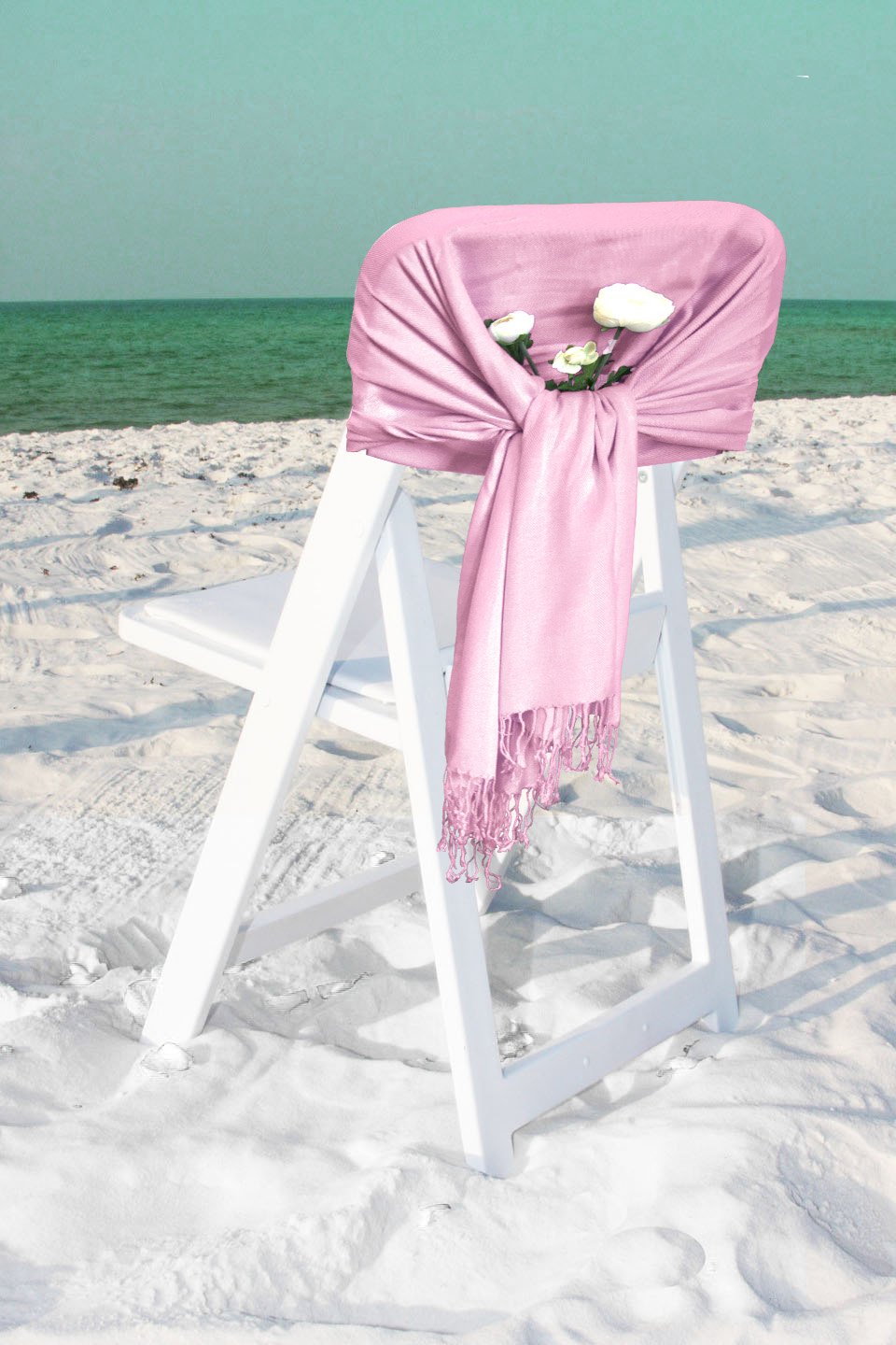 Pink pashmina-style shawl wrap scarf with fringe ends, solid color, draped look.