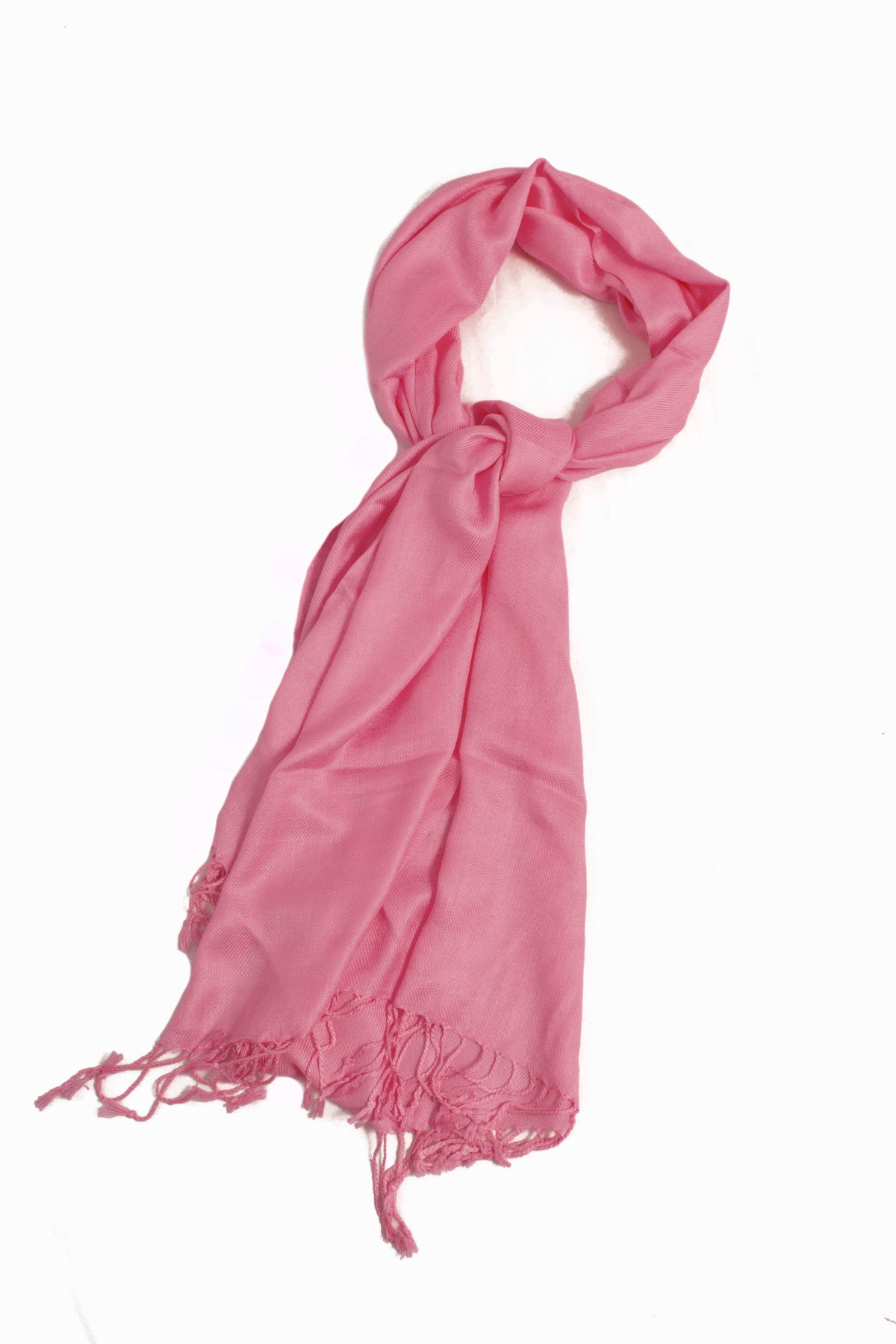 Soft pashmina feel shawl wrap scarf in dusty pink, draped with tassel fringe