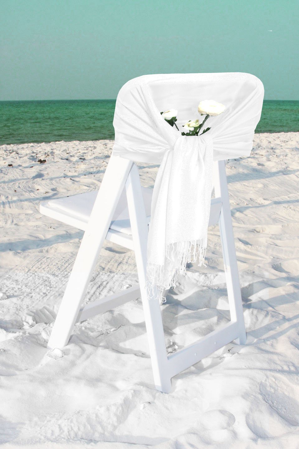 Silky pashmina-style shawl wrap in white, draped and finished with dangling fringe.