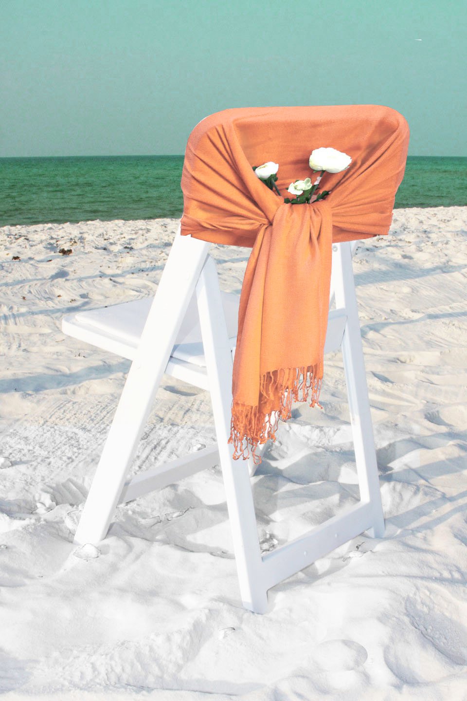 Coral orange pashmina-style shawl with fringed ends, solid color wrap scarf