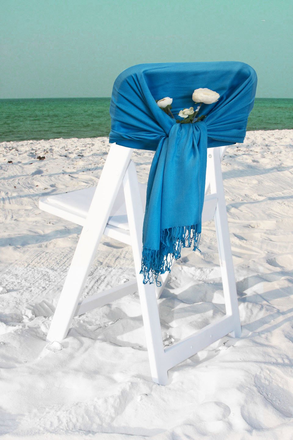 Teal-blue pashmina-style shawl wrap scarf with fringed ends, solid color.