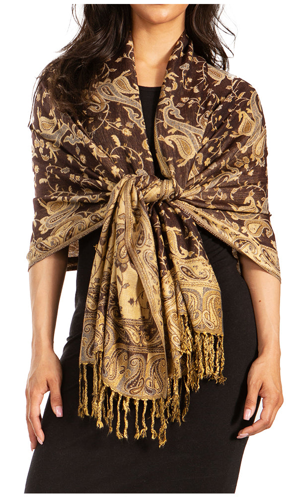 Brown and gold paisley pashmina shawl with tassel fringe, knotted drape at center