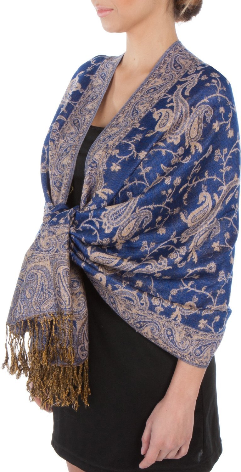 Blue paisley pashmina shawl wrap with long fringe tassels, draped at the shoulder.