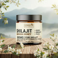 Shilajit resin with Manuka honey in an amber jar with a black lid