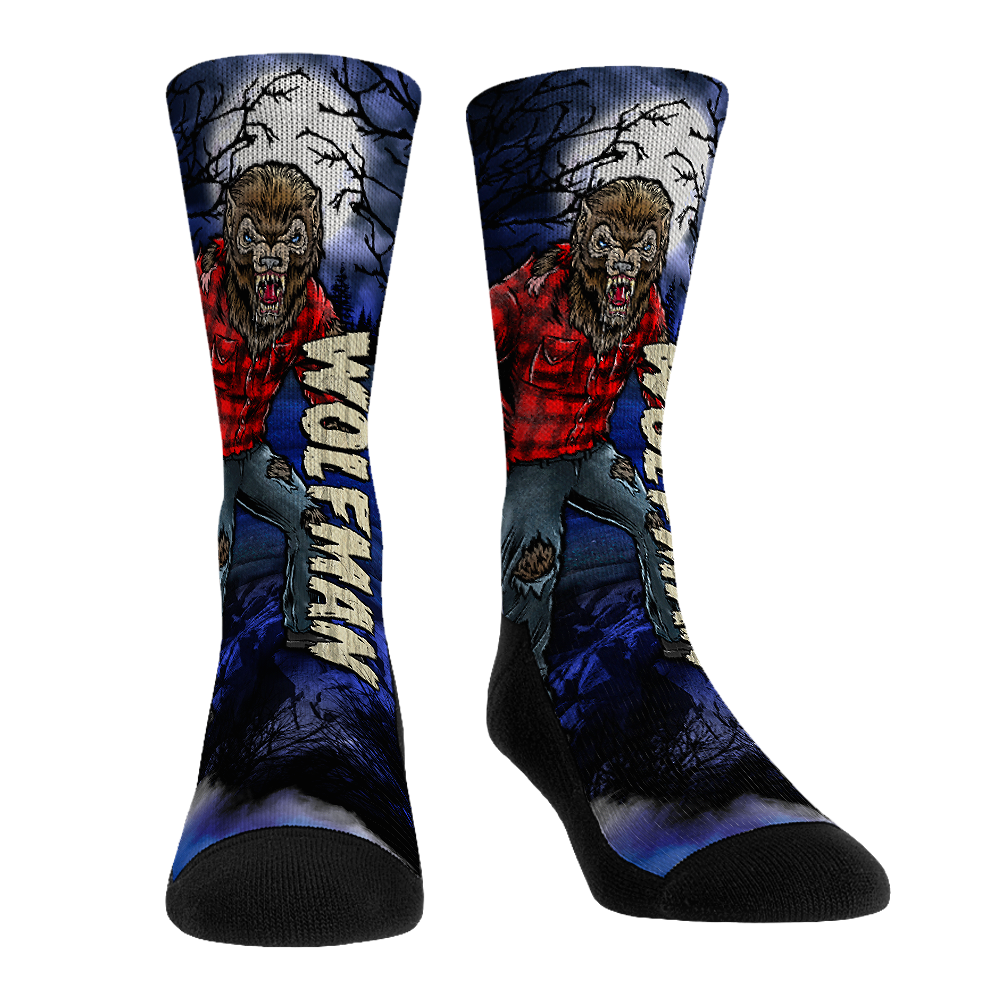 Crew socks with wolf cartoon graphic, red and blue pattern, black toe and heel