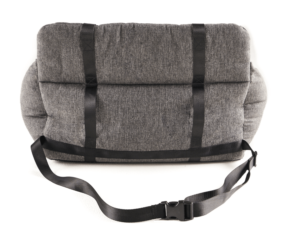 Gray dog car bed with black fastening straps across the outer cover.