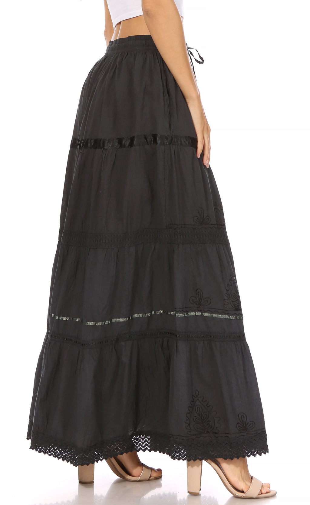 Black long cotton gypsy skirt with tiered panels, embroidered designs, and lace hem