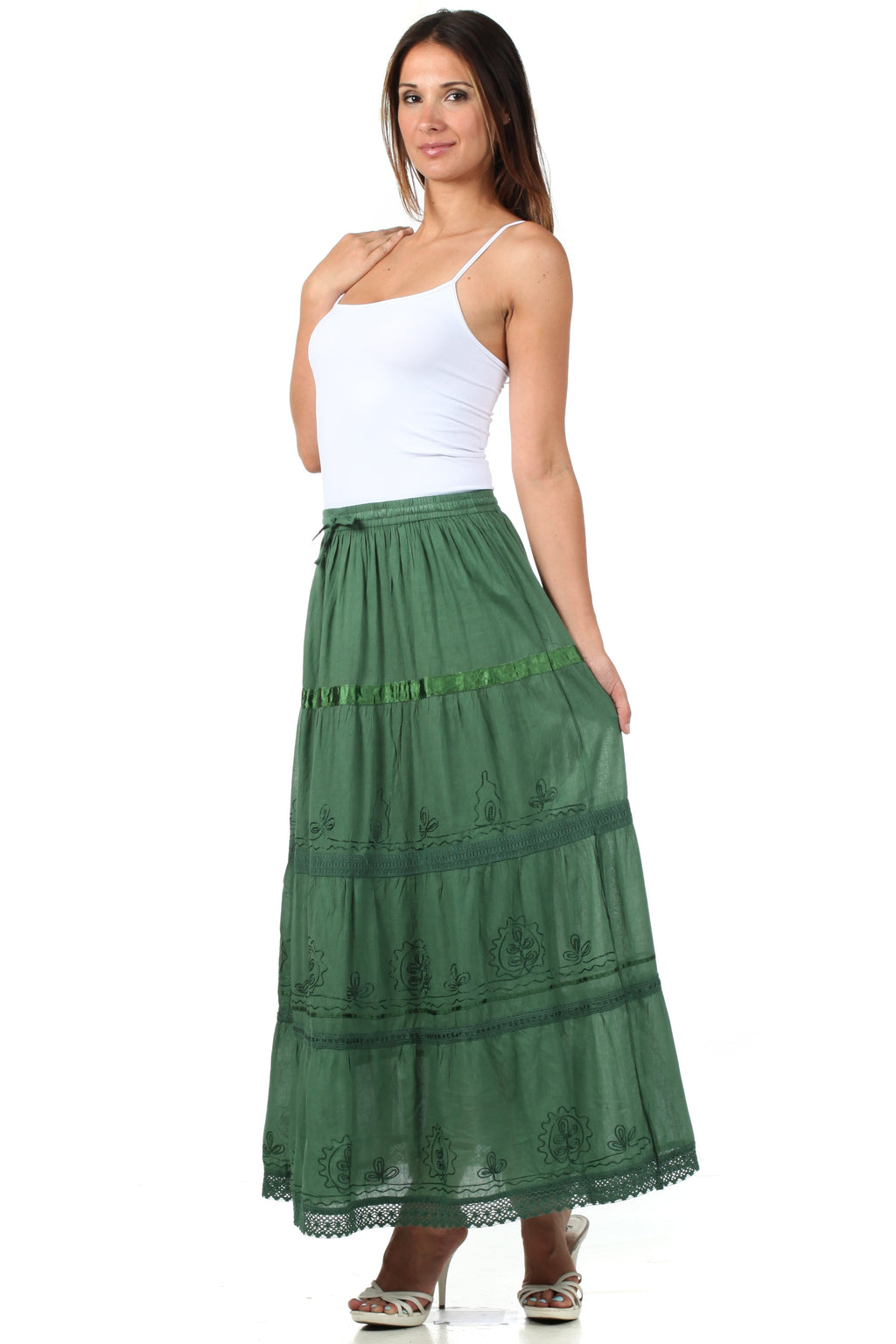 Green cotton maxi skirt with tiered panels, embroidered trim, and lace border
