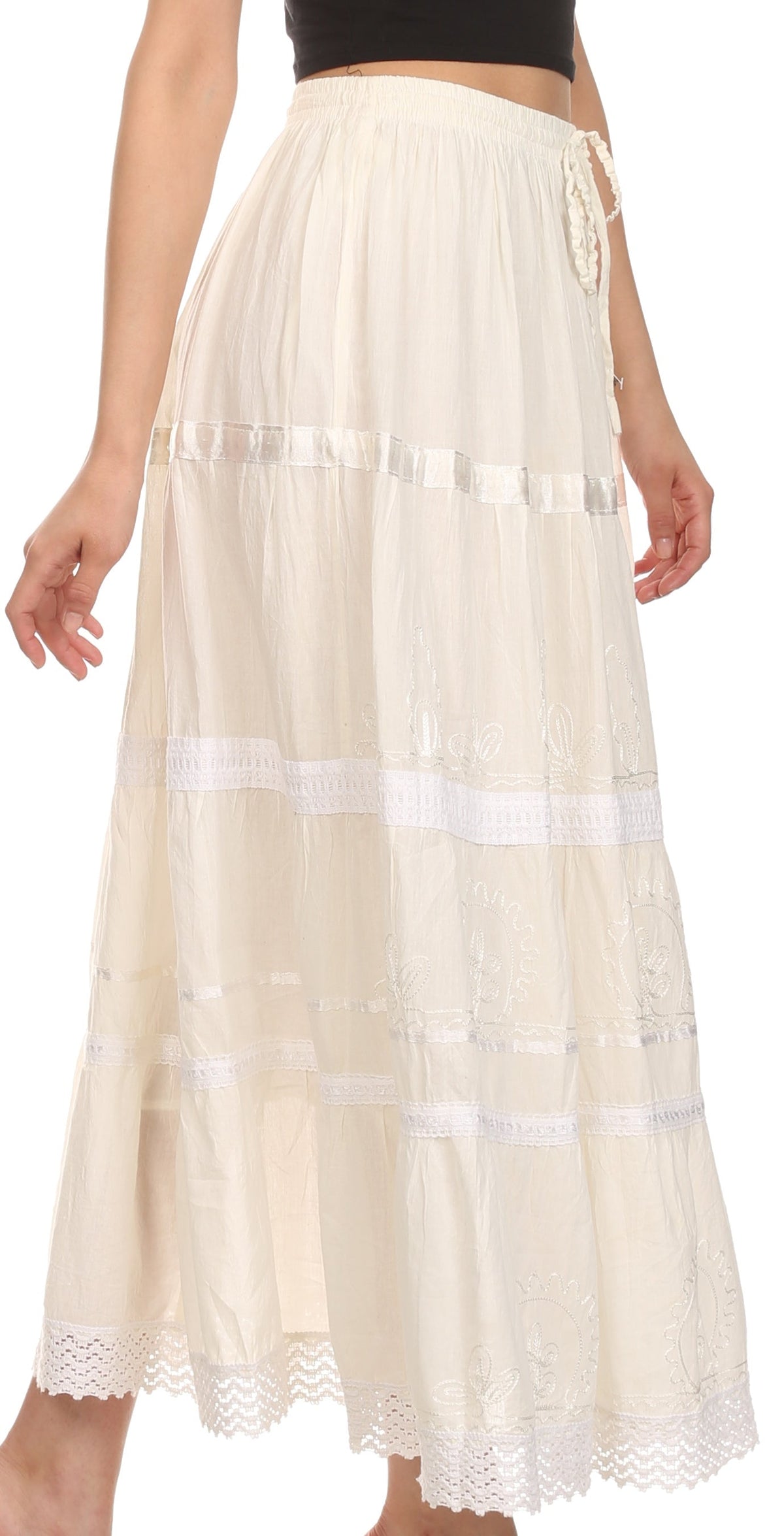 Ivory cotton maxi skirt with elastic waist, tiered embroidery, and lace border hem