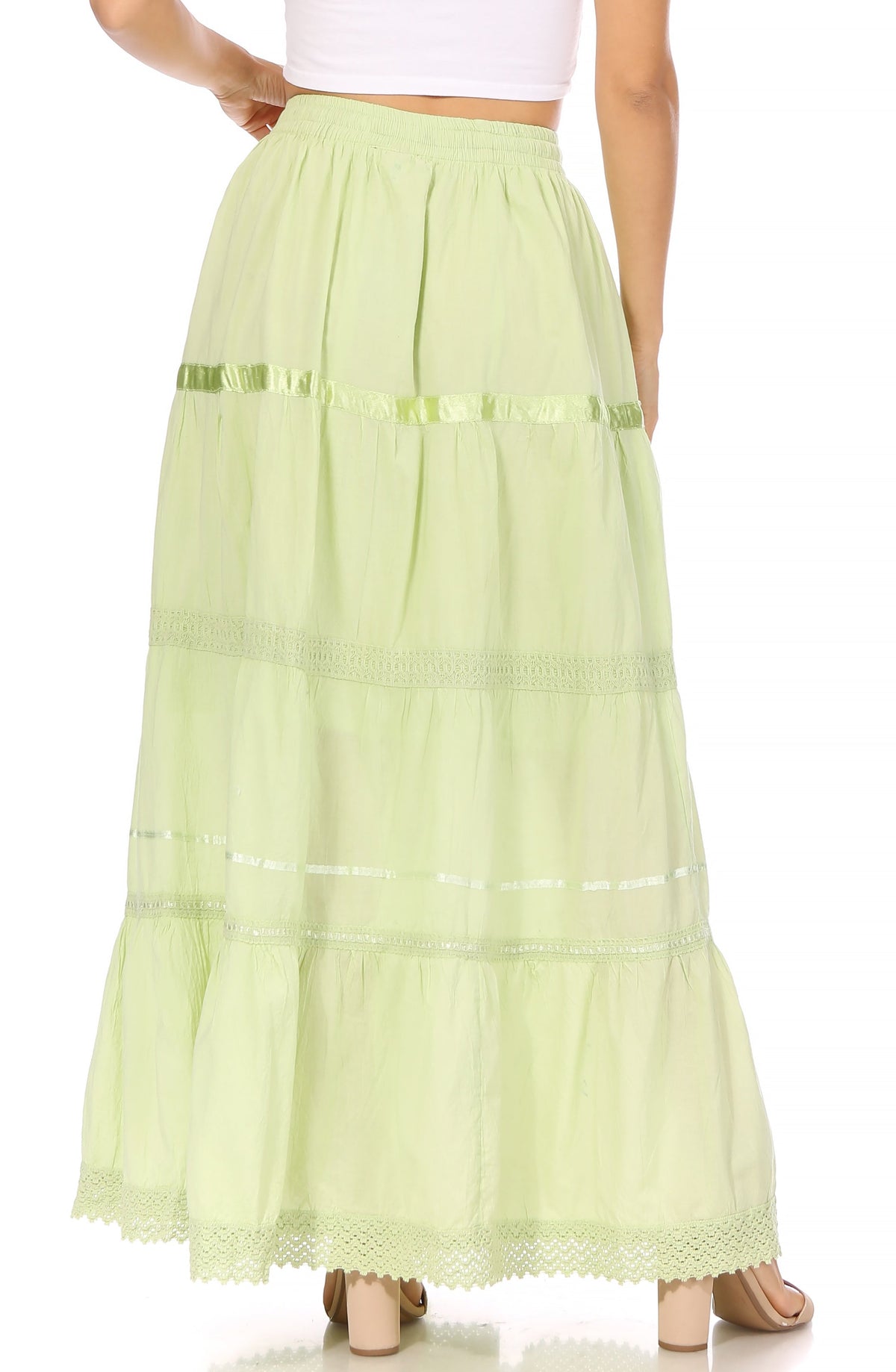 Pale lime green long cotton skirt with tiered panels, elastic waist, and lace-trim edge