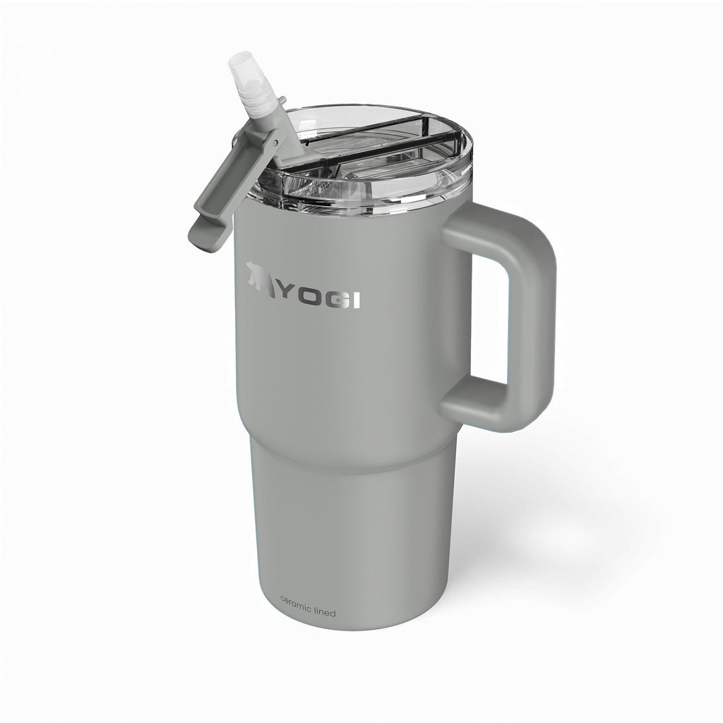 Slate gray ceramic-lined Evolution tumbler with clear open lid and side handle.