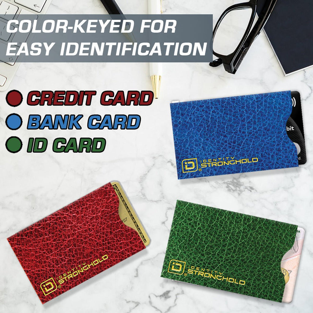 Assorted color RFID blocking card sleeves (blue, red, green) laid on surface