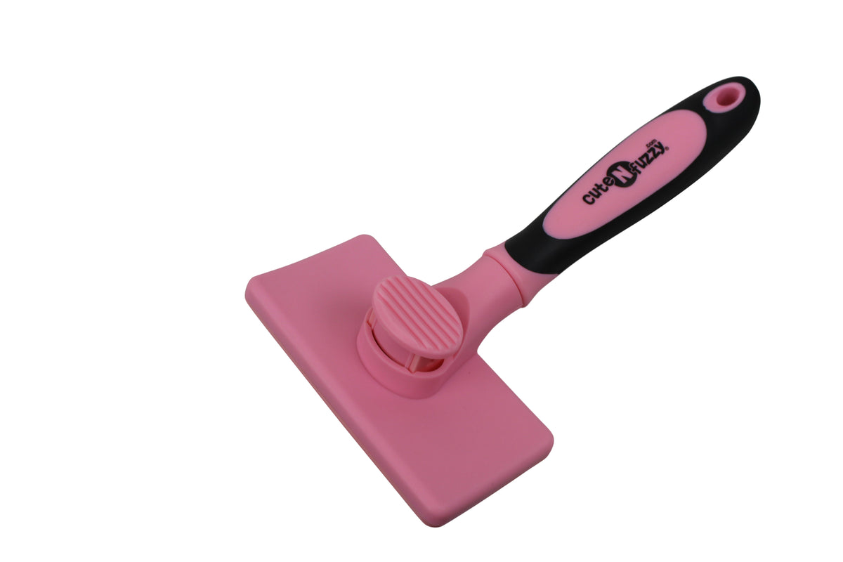 Pet slicker brush with pink grooming head, black-and-pink handle, steel bristles; cuteNfuzzy®