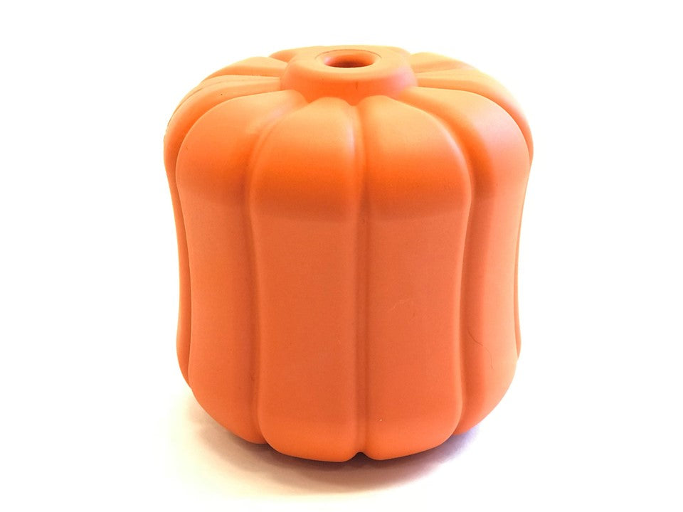Orange jack-o'-lantern dog treat dispenser toy with top fill hole.