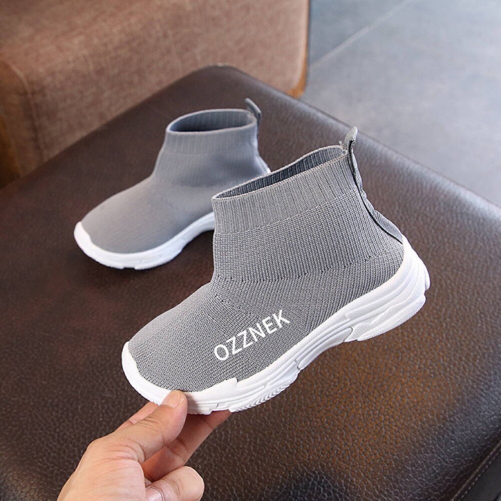 Kids slip-on sneakers, light grey knit upper and white cushioned sole with sock-like fit