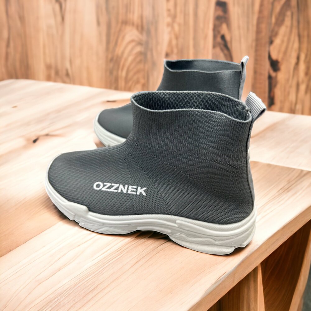 Kids slip-on sneakers, dark grey knit upper and white sole with pull-on elastic tab