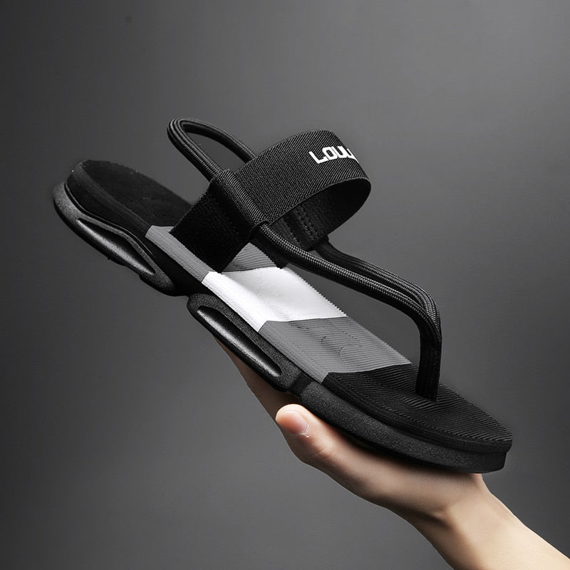 Black ankle wrap slide sandals with white stripe, adjustable strap, slip-resistant sole