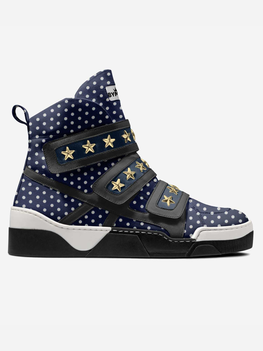 Navy polka-dot high-top vegan sneakers with gold star straps and black sole