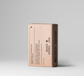 Beige hair and body cleansing bar with Orris & Santal label