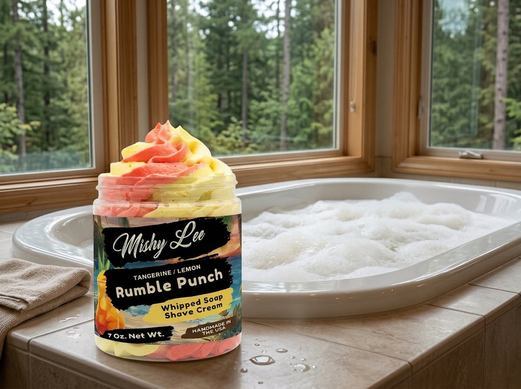 Whipped soap and shave cream jar with tangerine lemon label and pink-yellow swirl top