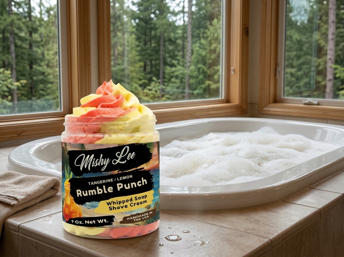 Whipped soap and shave cream jar with tangerine lemon label and pink-yellow swirl top