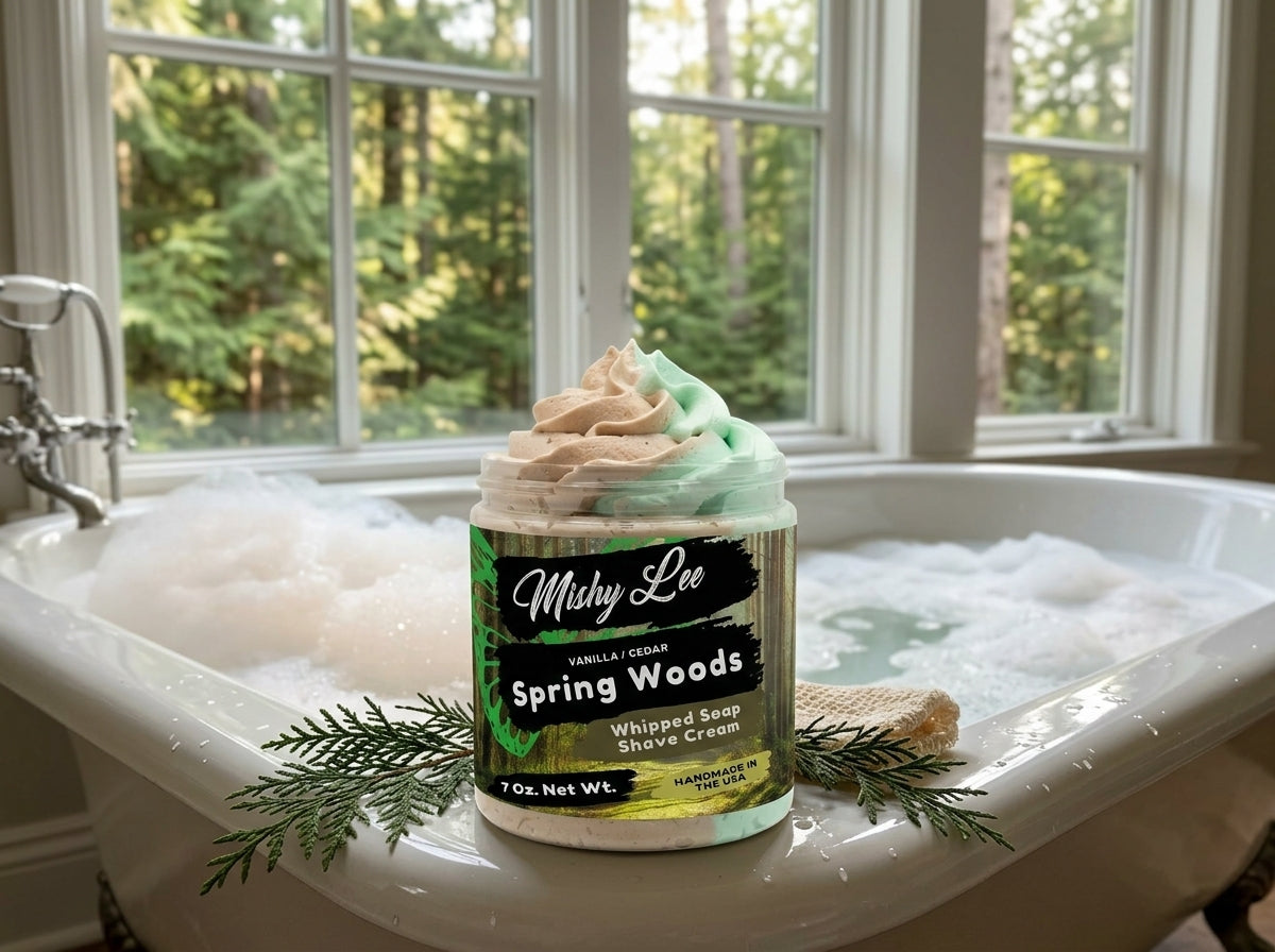 Mishy Lee Spring Woods whipped soap and shave cream jar in a white bathtub with foam