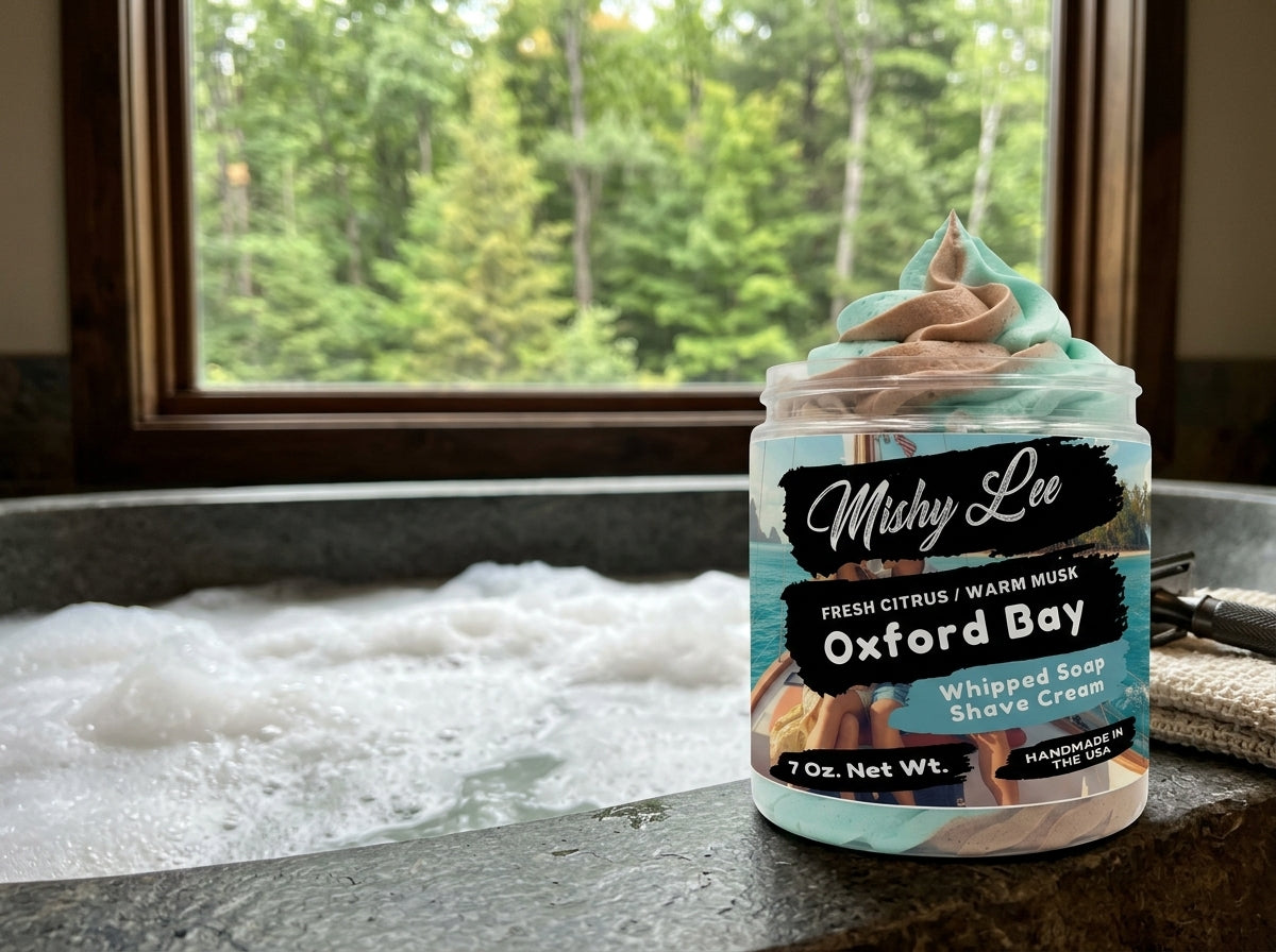 Whipped soap shave cream jar on bathroom counter with teal and tan swirls, Oxford Bay