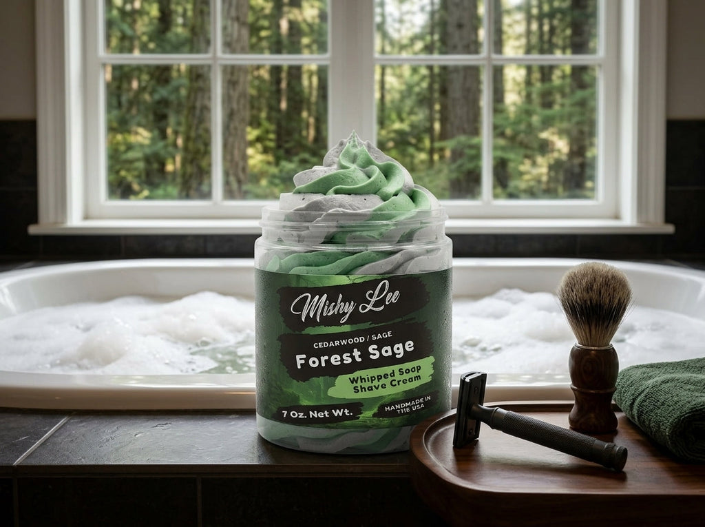 Whipped soap and shave cream jar with green foam swirls by a sink and window