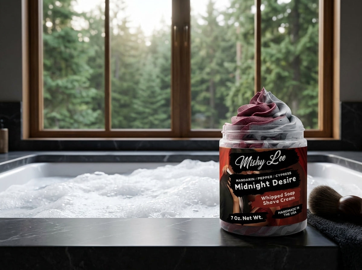 Whipped shave cream jar with maroon and gray swirls on bathroom countertop
